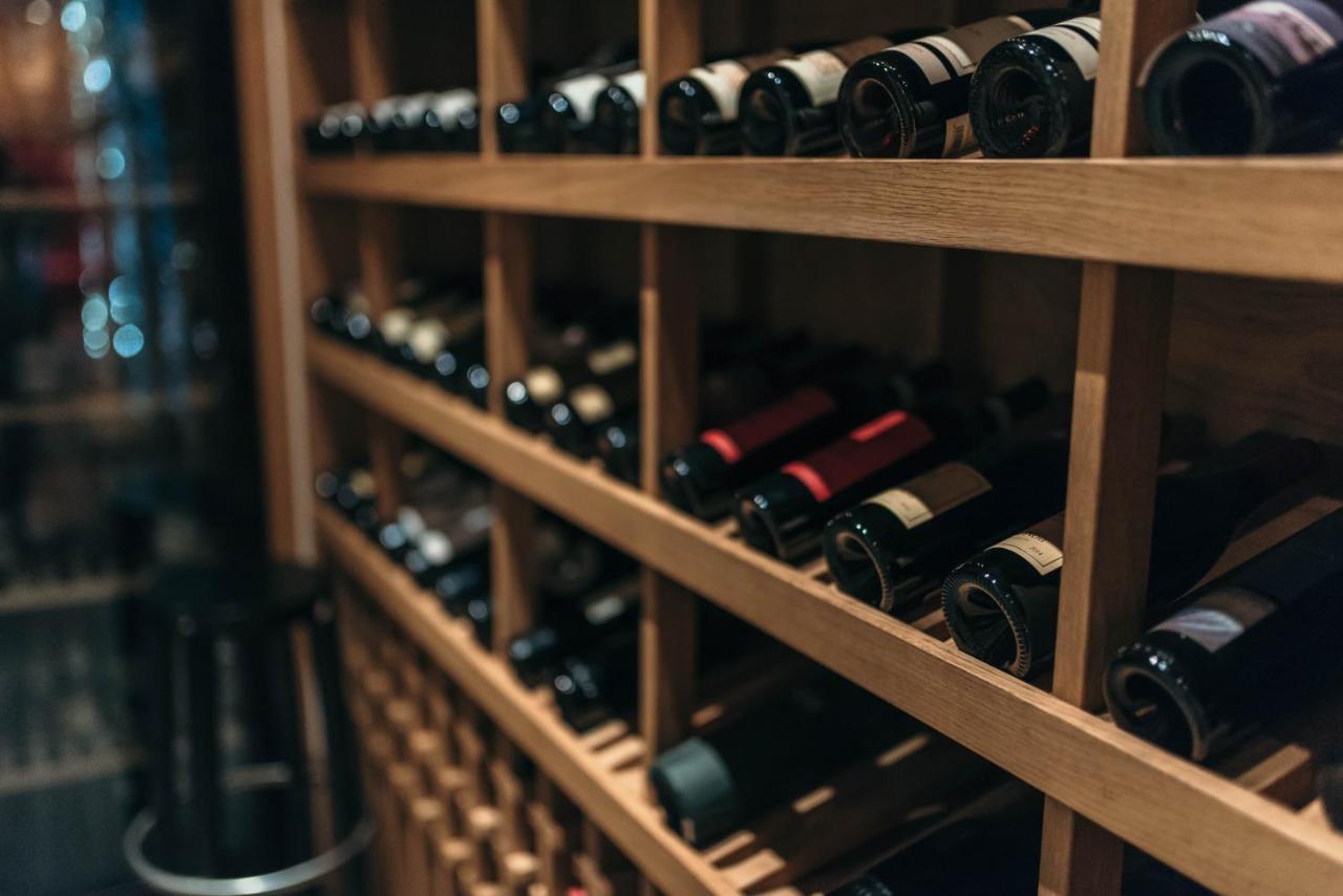 Graffit Gallery Design Hotel Varna Exterior photo Wine bottles in a wine rack